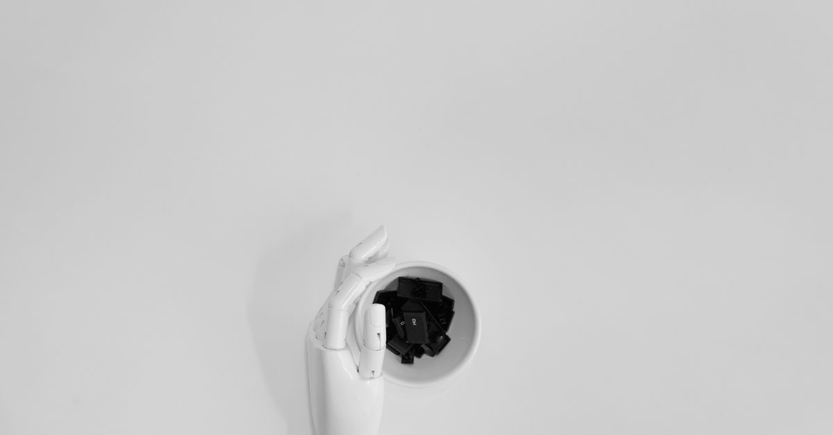 키보드를 타이핑하는 AI 로봇 손의 개념적 이미지